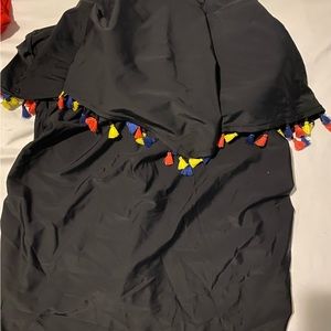 Very cute black swim top with tassels.